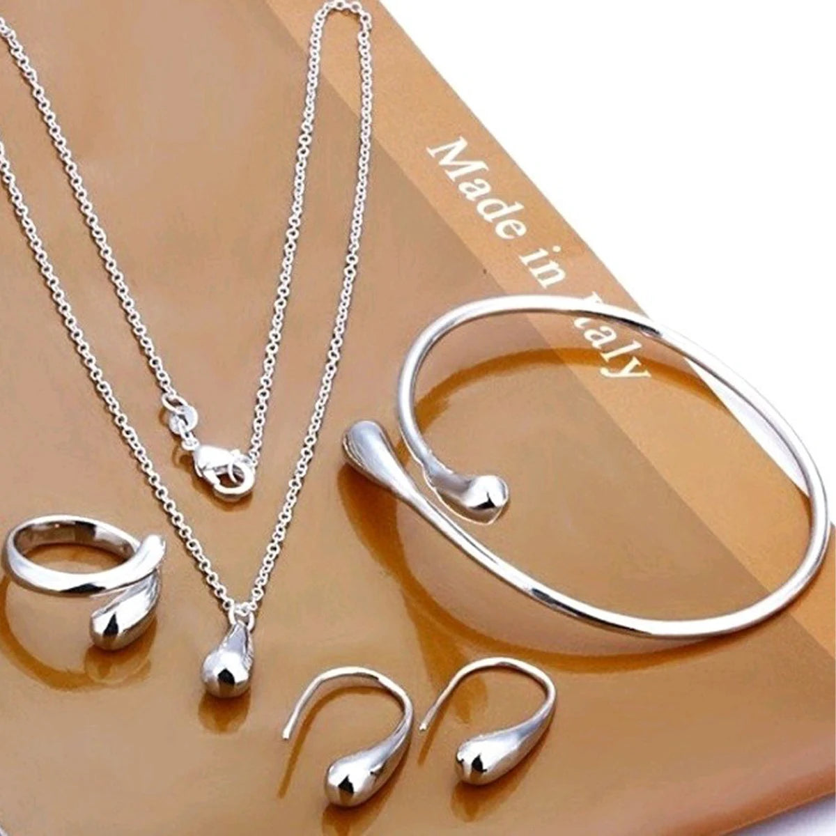 Elegant Women's Jewelry Set with Curved Bean Design - Smarsty
