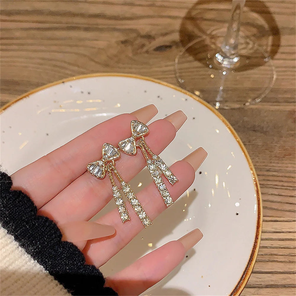 Trendy Zircon Bow Earrings with Crystal Tassel for Women - Smarsty