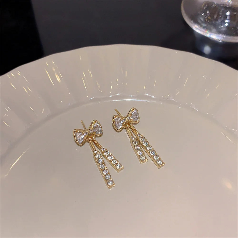 Trendy Zircon Bow Earrings with Crystal Tassel for Women - Smarsty