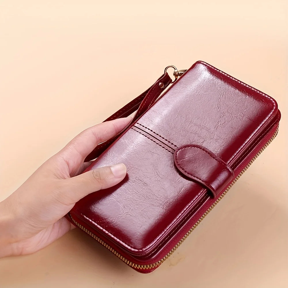 Bright and shiny wax leather long wallet that can hold multiple cards, card bags, and comes with a wristband