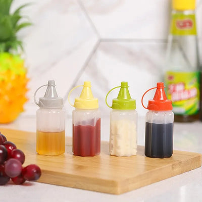4PCS Kitchen Household Sauce Vinegar Squeeze Bottle Portable Outdoor Barbecue Picnic Feast Bottle Kitchen Accessories Small Tool by Smarsty