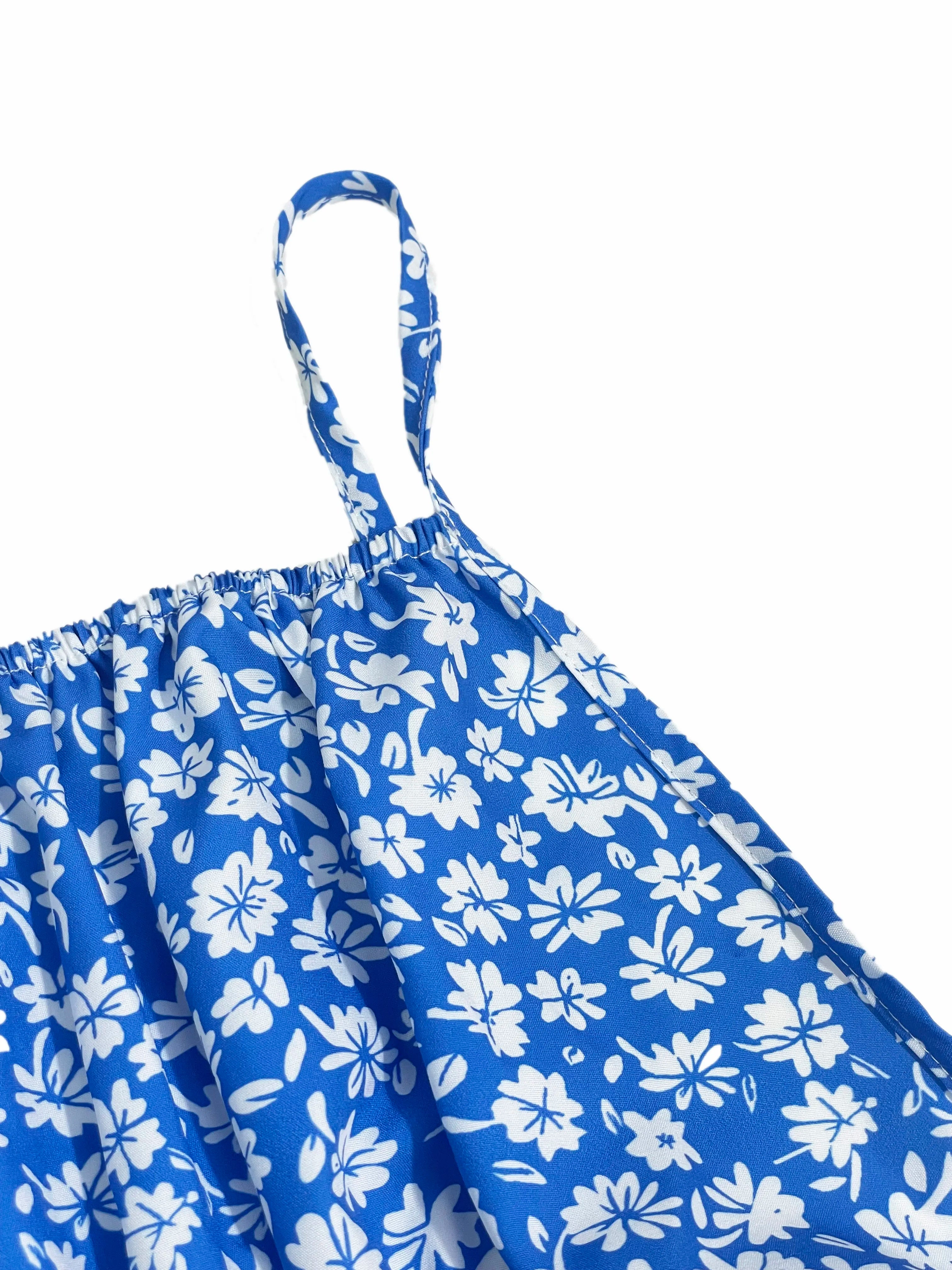 The cami dress with small flower prints a backless design and thin spaghetti straps is suitable for beach vacations and summer - Smarsty