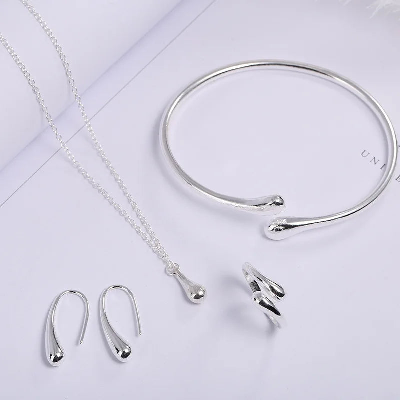 Elegant Women's Jewelry Set with Curved Bean Design - Smarsty